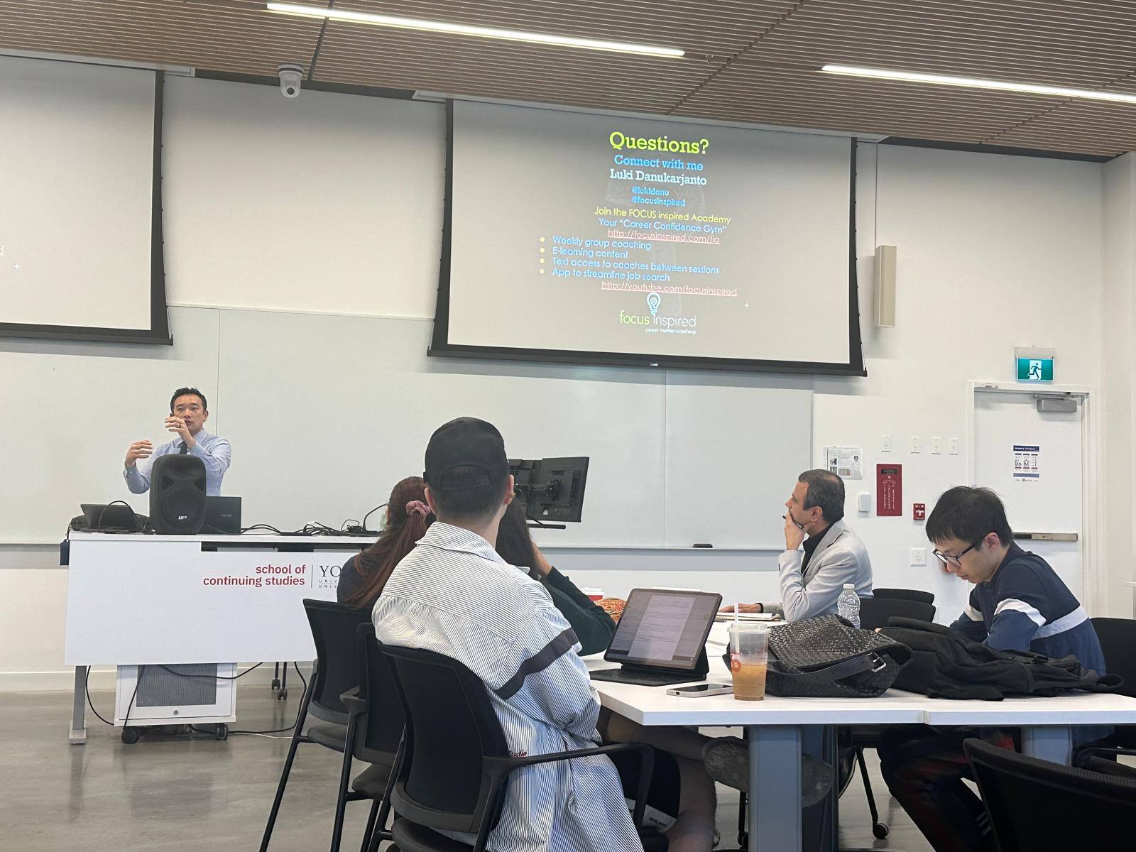 classrom with students and professor with guest speaker explaining about linkedIn 